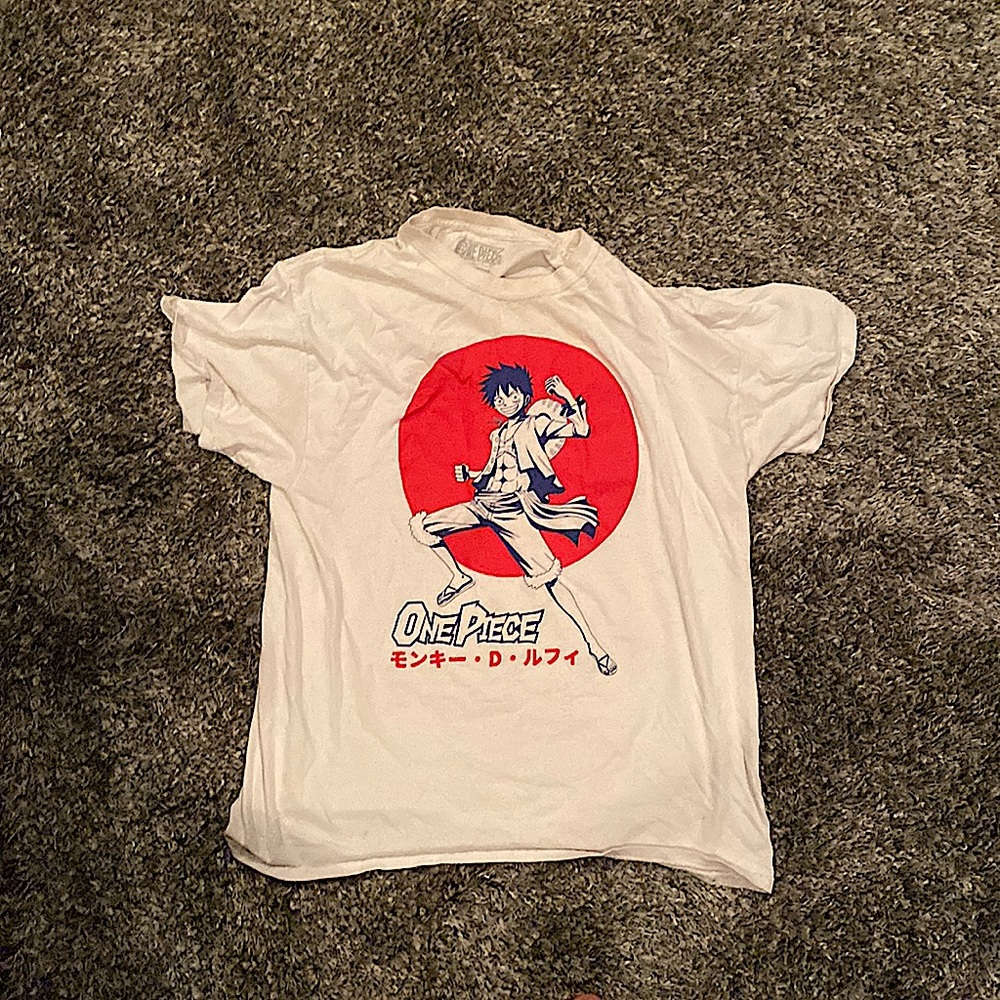 I’m selling a one piece t-shirt, the brand is Ripple Junction, and it is size L